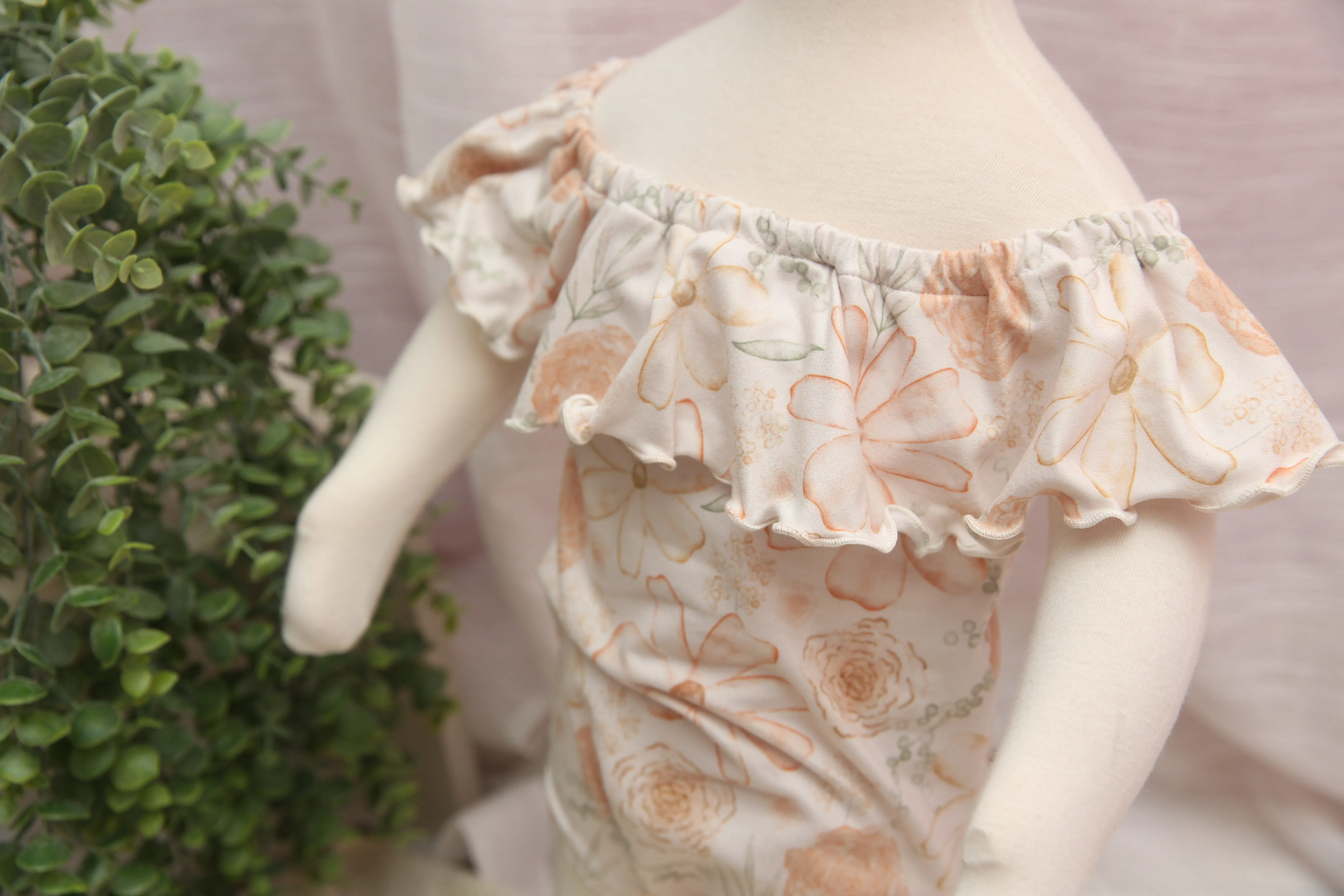 Anisa- Sitter Flutter Romper; Sitter Romper; Peach Pop Floral; READY TO SHIP